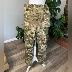 #6)  women Lightweight camouflage pants with lots of pockets.  never worn.
